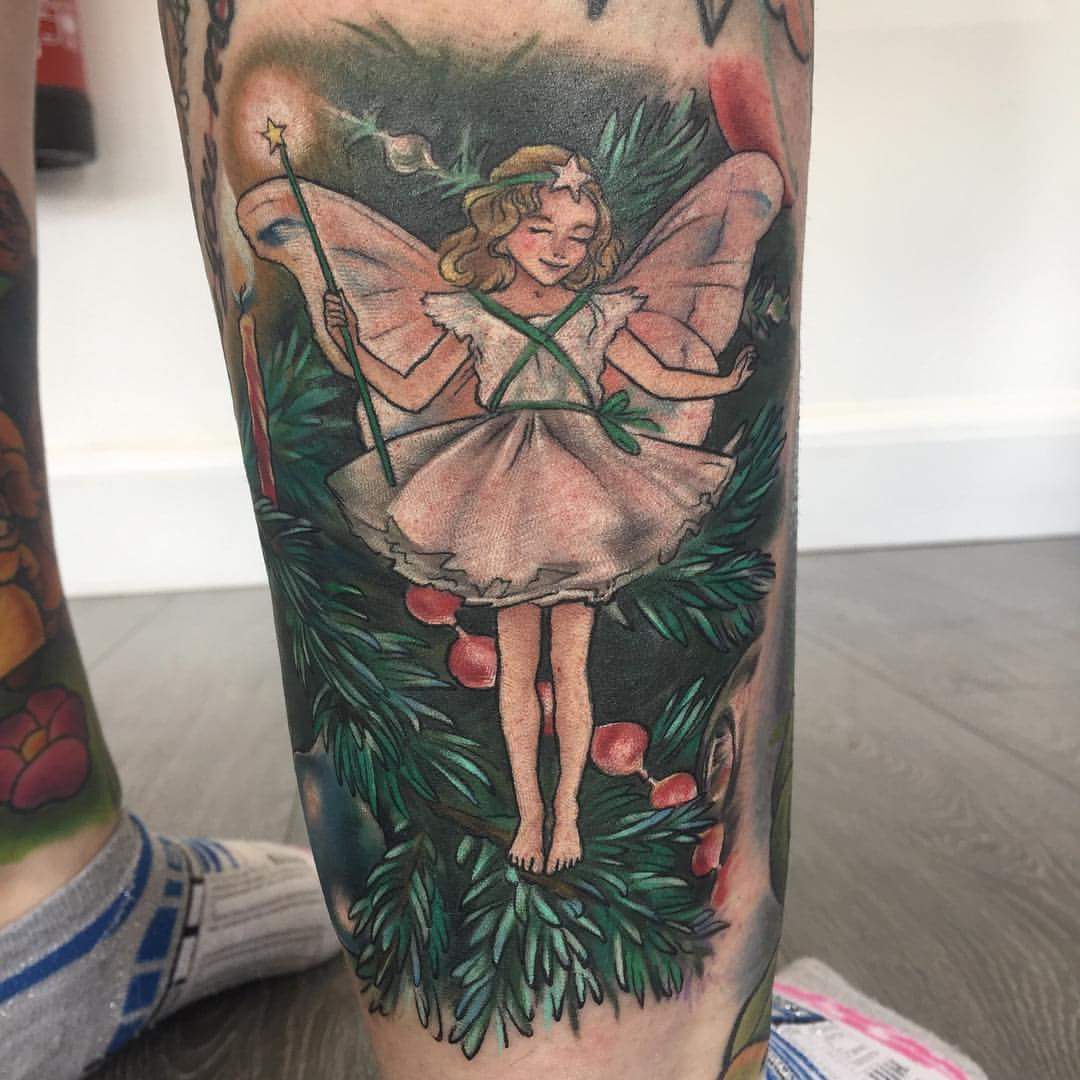 #Christmas #Tattoos Adorable fairy tattoo design for the back of the leg