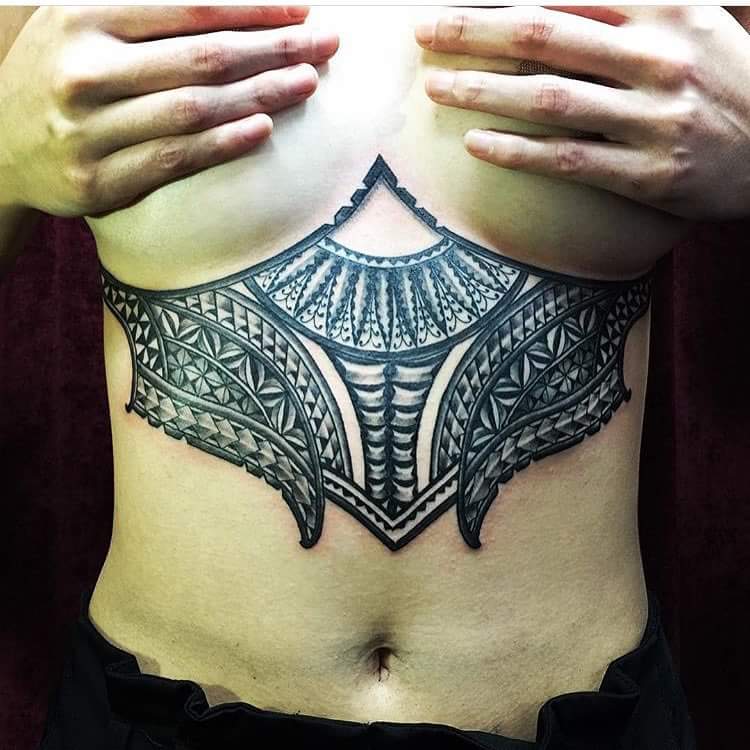 #Polynesian #Tattoo Attractive idea of tattoo covering the rib cage