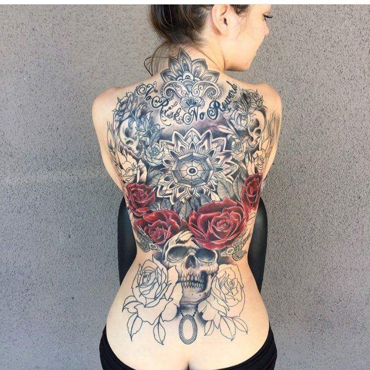 #Polynesian #Tattoo Innovative rose and skull design tattoo for entire back coverage