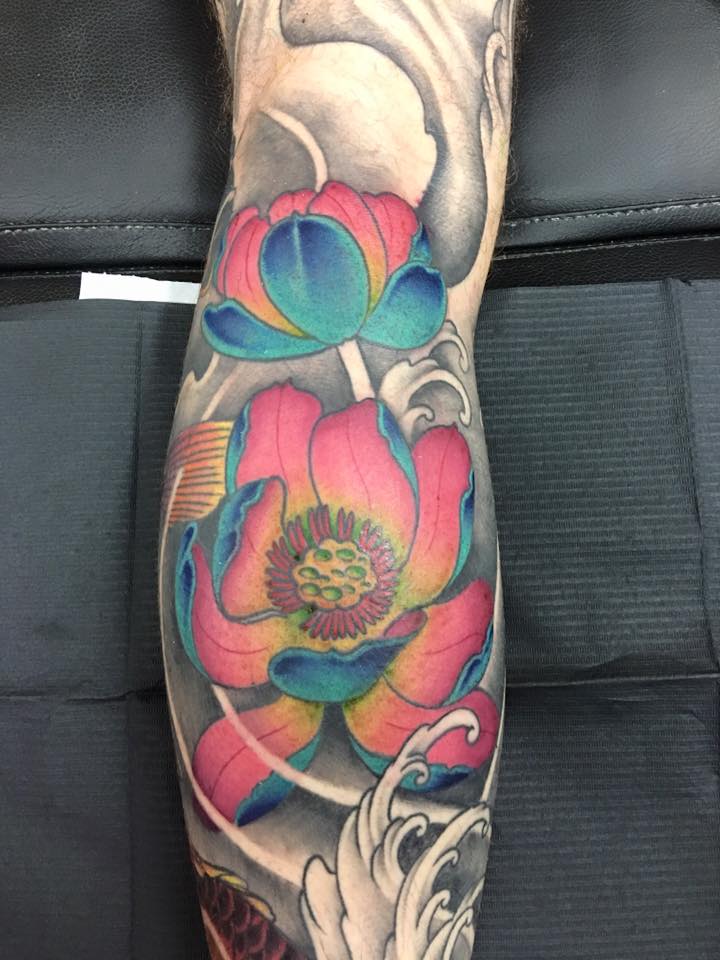 #Lotus #Flower #Tattoo Lotus Flowers tattoo with muliticoloured