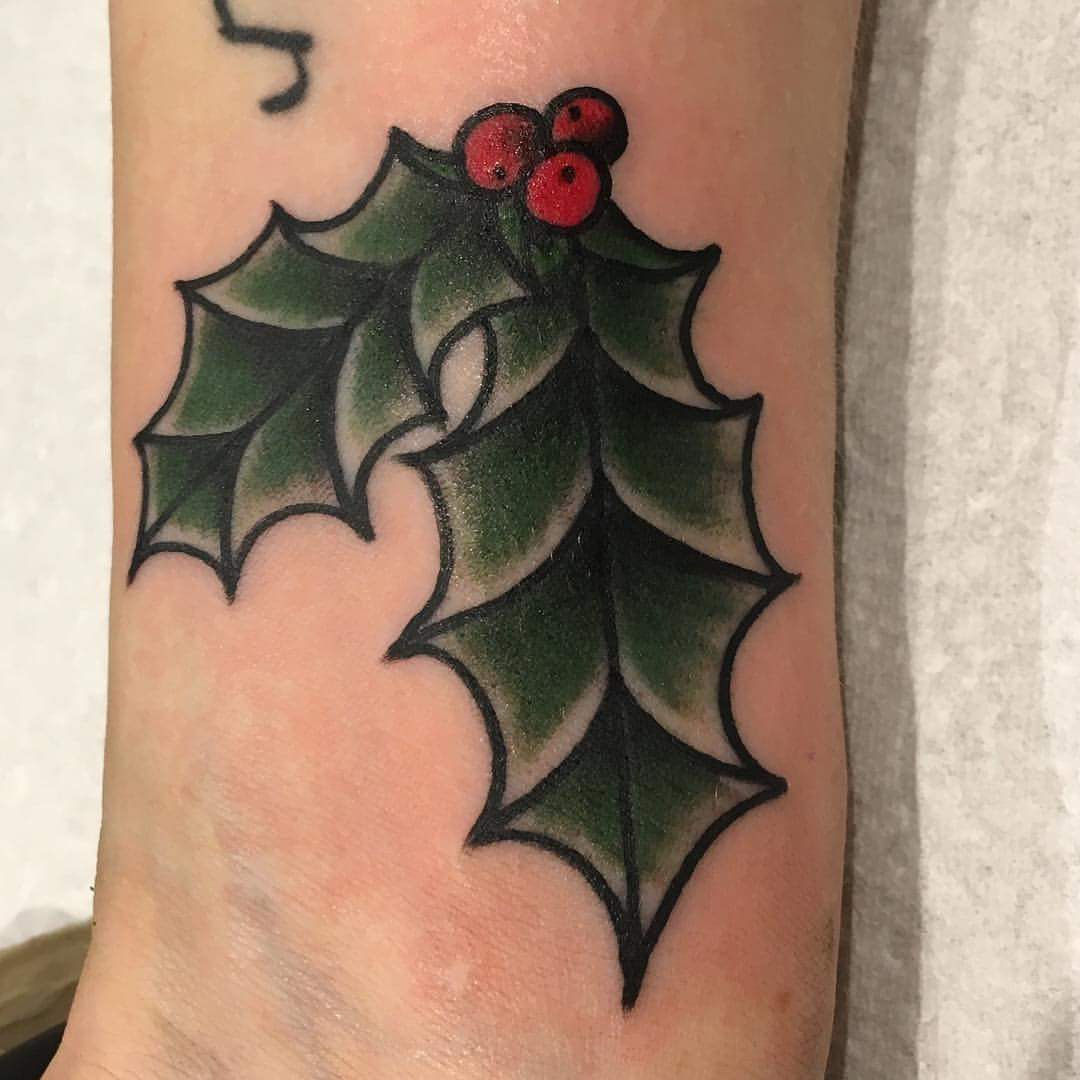 #Christmas #Tattoos Simple and elegant leaf tattoo design