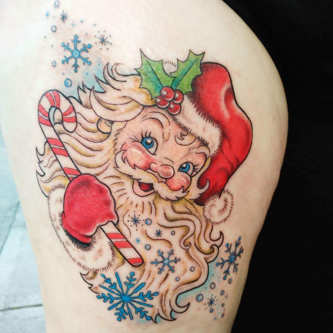 #Christmas #Tattoos Stunning and extremely eye-catching tattoo idea on the upper leg area
