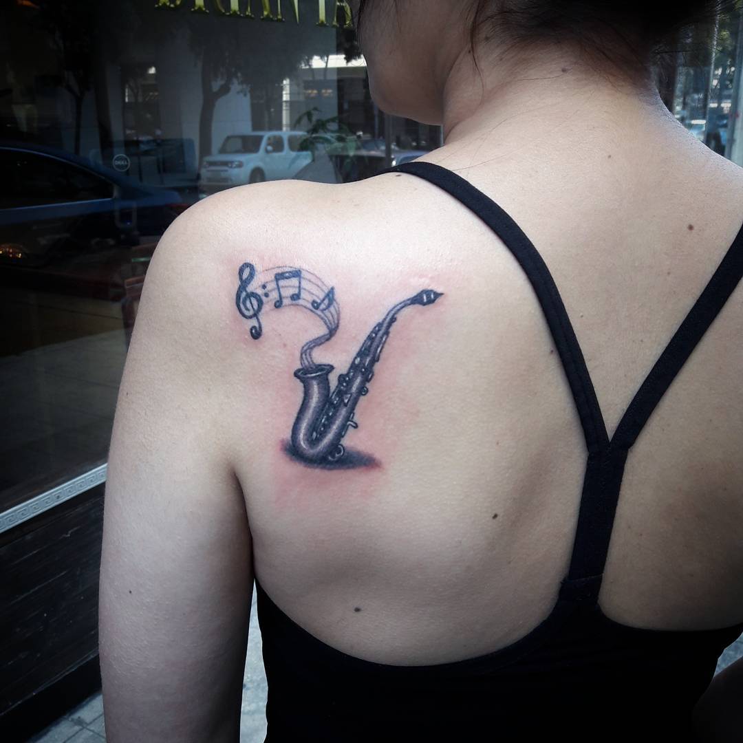 #3D #Tattoos Saxophone With Music Notes