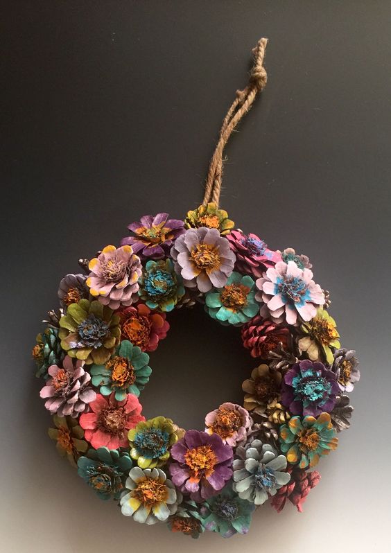 Awesome pinecone flower wreath.