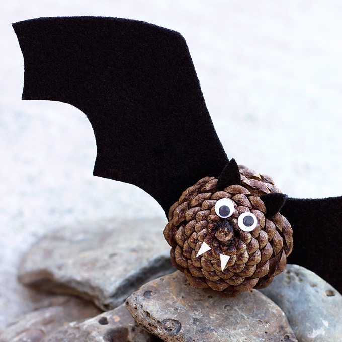 Black felt, pinecones, and wiggly eyes are all kids need to create a small colony of creepy-cute Pinecone Bats.