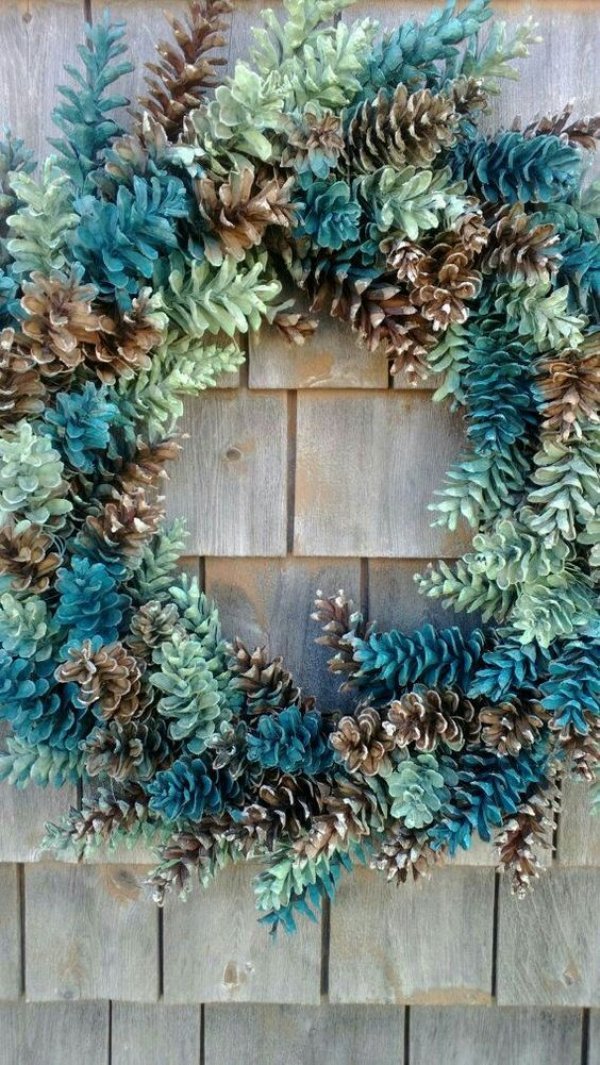 Colorful and beautiful pinecone wreath.