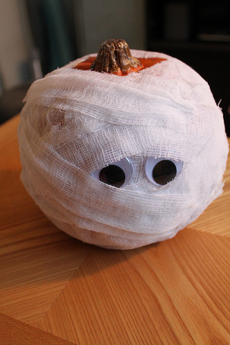 Cover a pumpkin in cheesecloth for a creepy decoration.