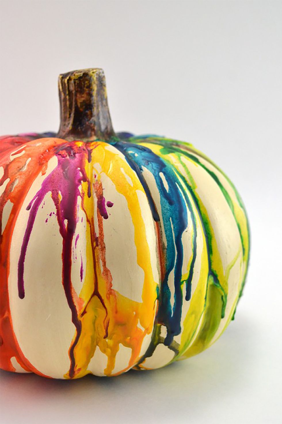 Exclusive idea to decorate pumpkin by melted crayons.