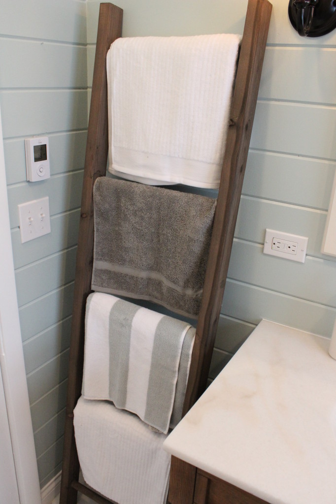 Hang your towels on a rustic ladder!