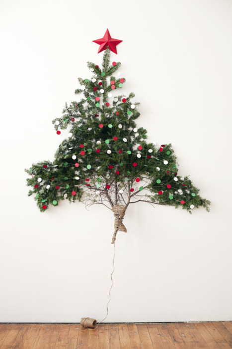 Mini wall tree with red star tree topper.
