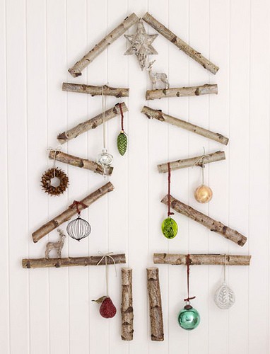 Reclaimed wood arranged as Christmas wall tree.