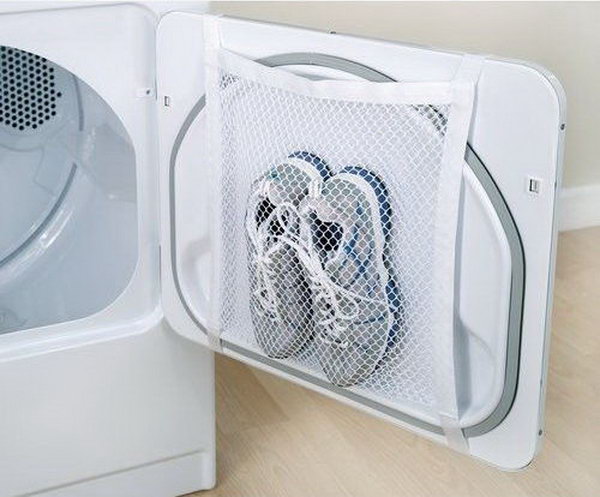 Tape a laundry bag to the inside of your tumble dryer door for easy drying of sports shoes.