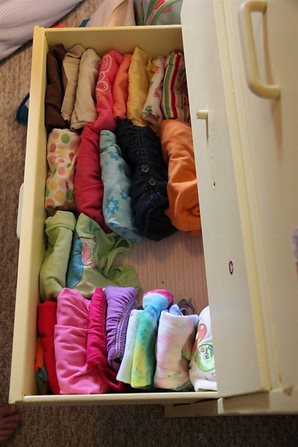 “File” clothes vertically in drawers.
