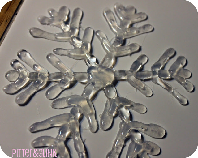 Hot Glue to Make Snowflake Ornaments.