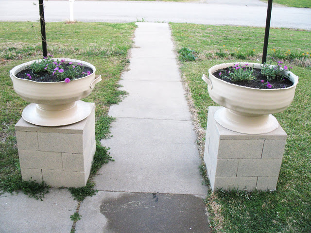 Tire Planters with Cinder Block Plinth.