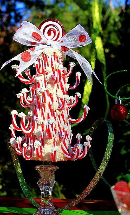 Candy cane topiary see the tutorial at Dollar Store Crafts. Christmas Candy Decorations