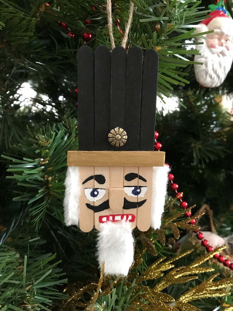 Easy wooden popsicle stick nutcracker ornament.