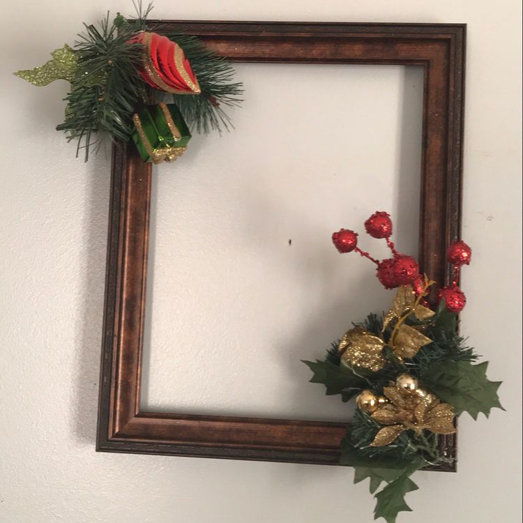Awesome picture frame Christmas wreath.