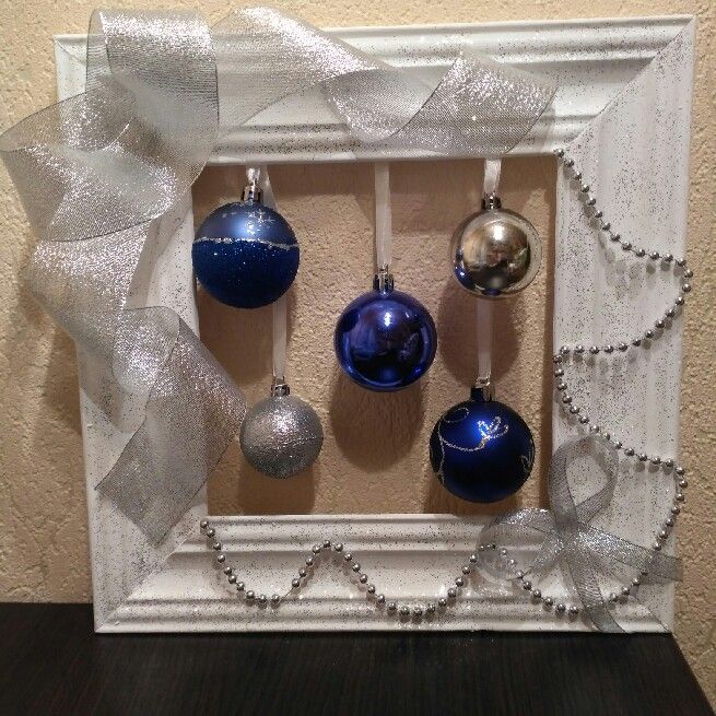 Create a picture frame Christmas wreath.