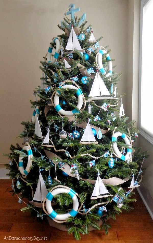 Nautical Christmas Tree Decor with Sailboat Ornaments.