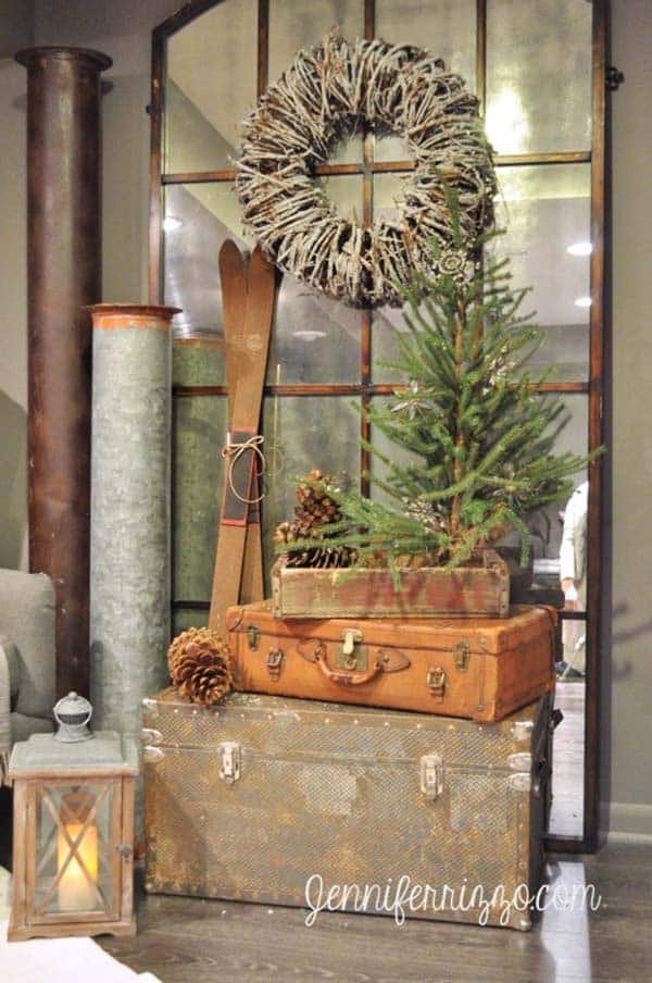 A country Christmas lodge-like display with rustic vintage items.