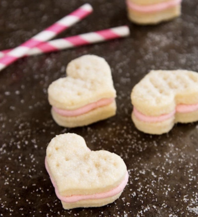 Cream Wafer Sandwich Cookies with Strawberry Buttercream.