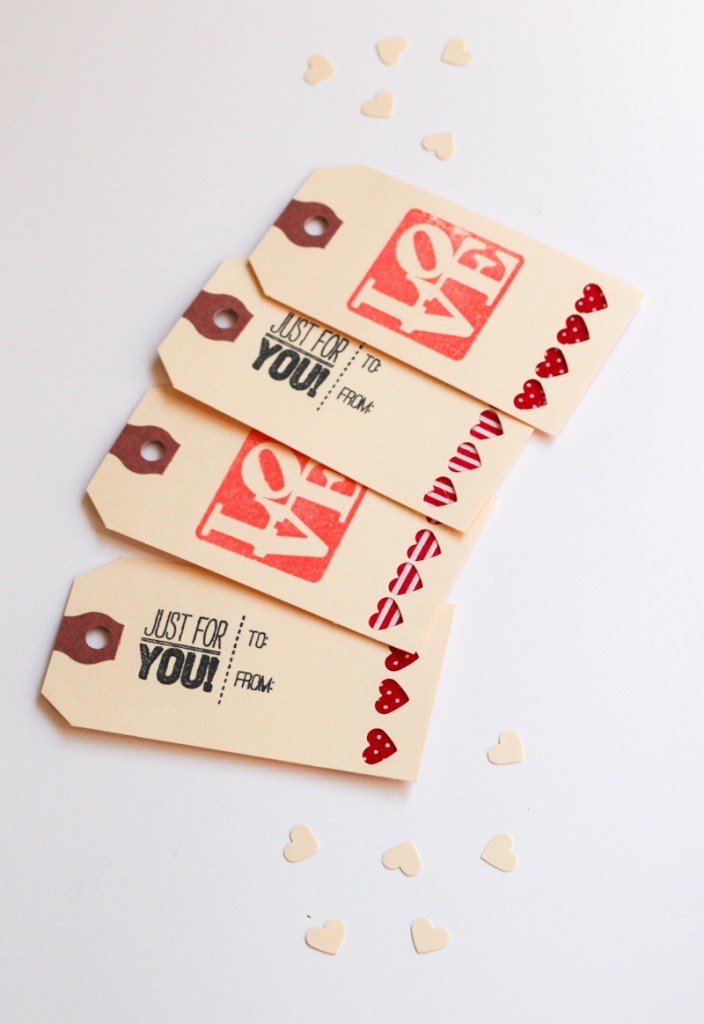 DIY Valentine's Day gift tags with fabric hearts.