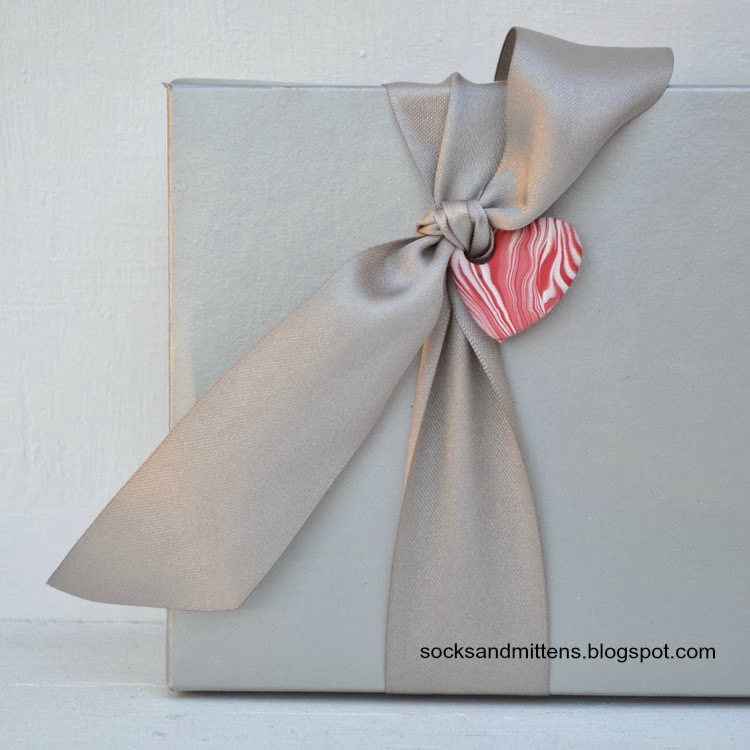 DIY polymer clay heart-shaped gift tag.