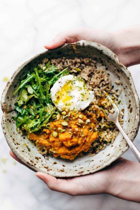 Healing Bowls with Turmeric Sweet Potatoes, Poached Eggs and Lemon Dressing.