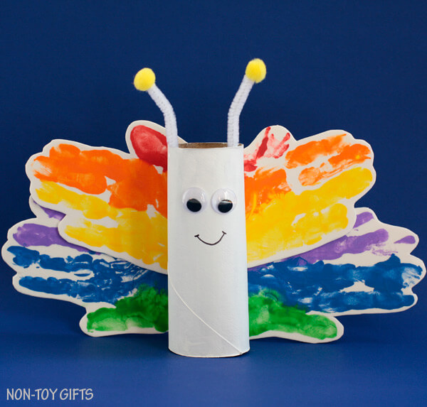 Make this paper roll rainbow butterfly with handprints by Non Toy Gifts